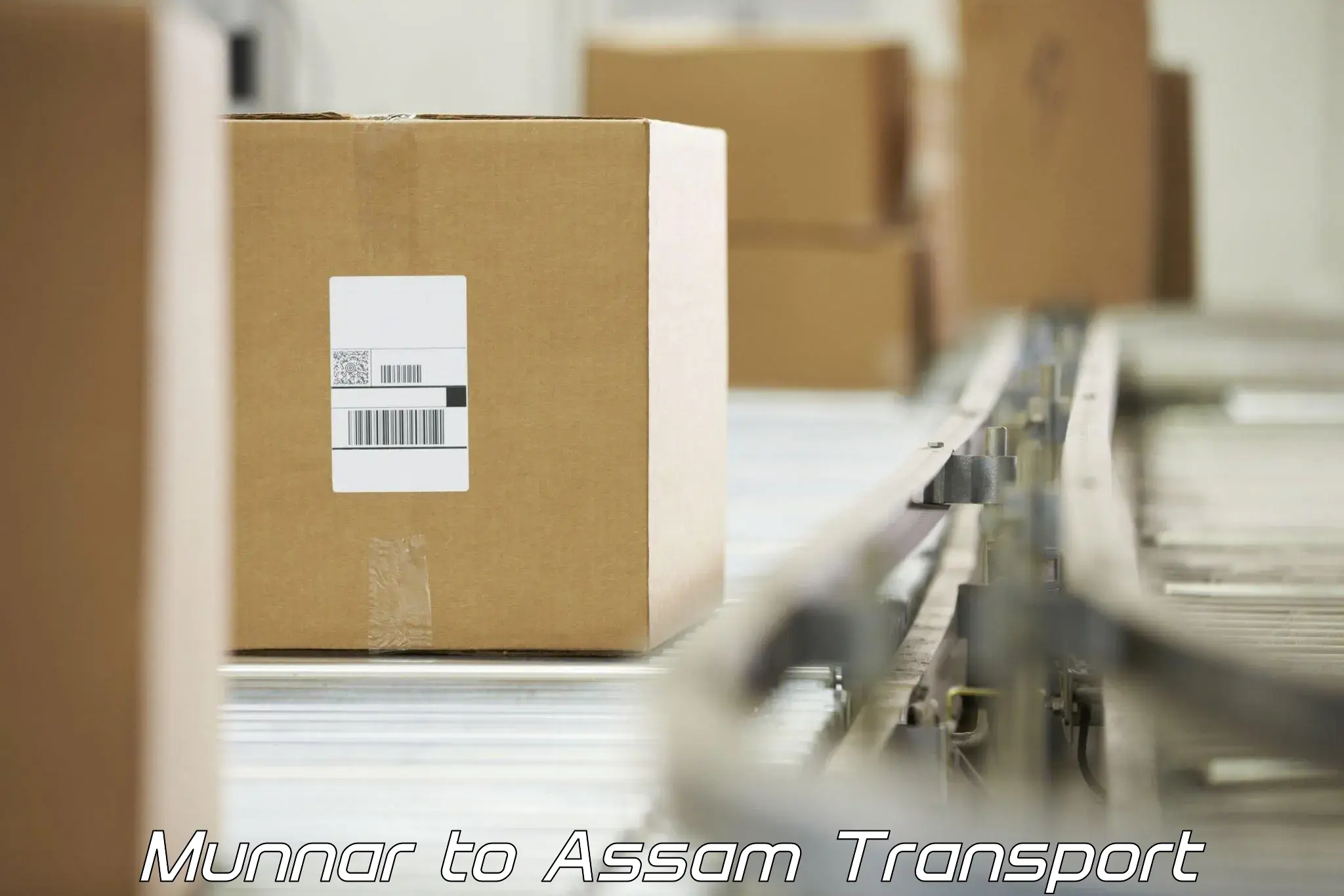 Two wheeler parcel service Munnar to Assam