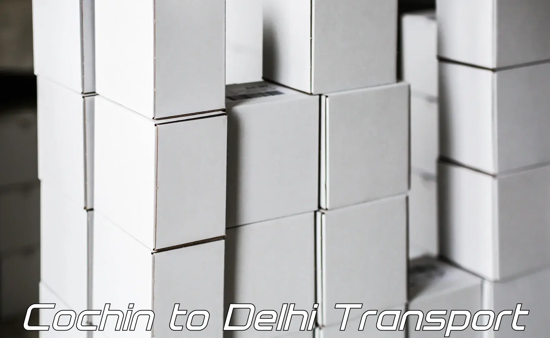 Door to door transport services Cochin to Delhi