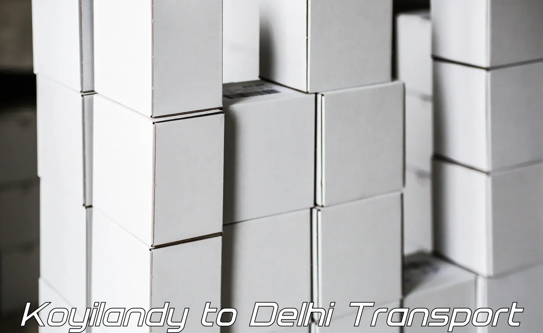 Lorry transport service in Koyilandy to Delhi Technological University DTU